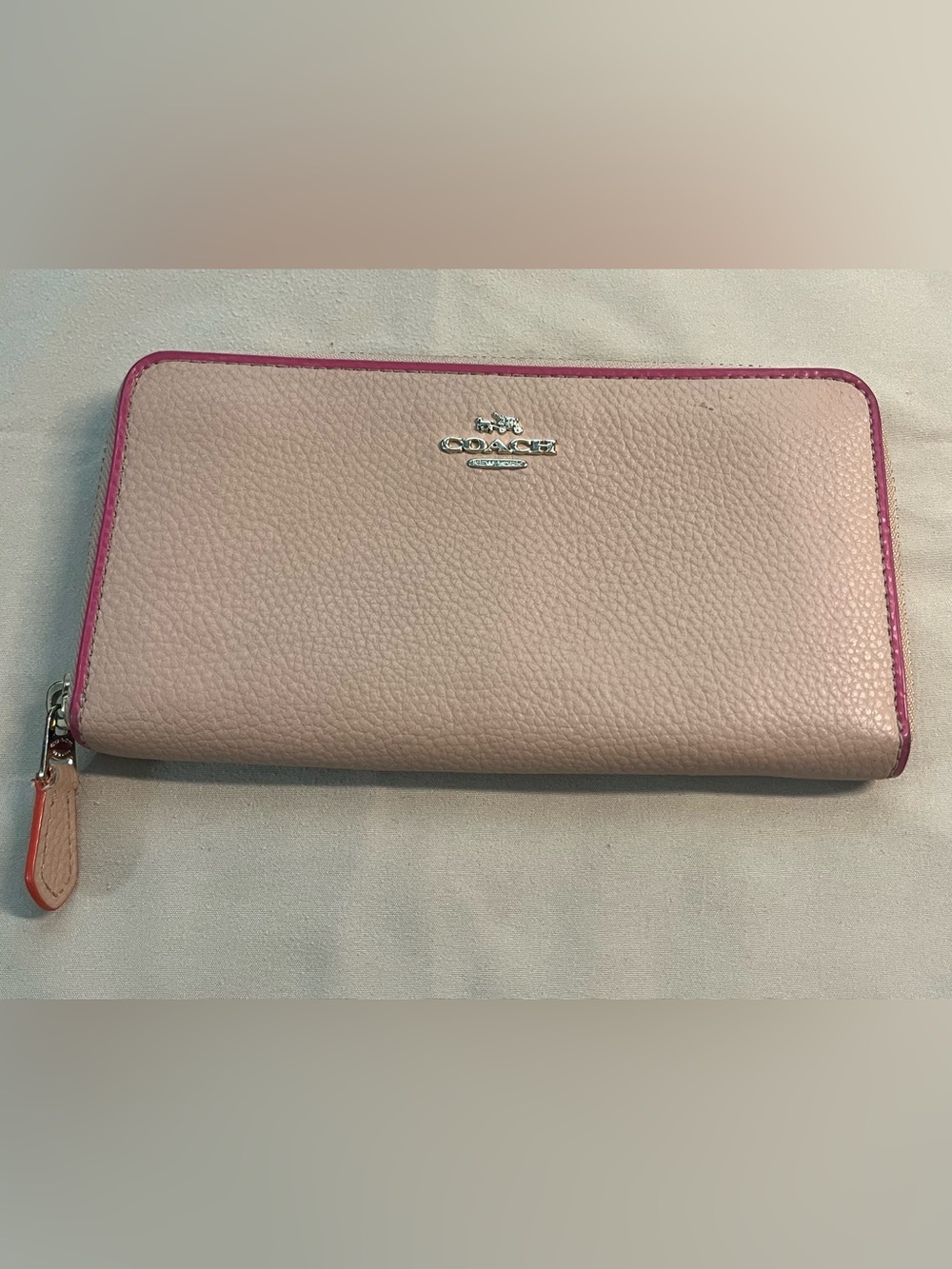 Coach Pebbled Leather Zip-Around Wallet-Nude with Fuchsia Trim/Orange Lining.